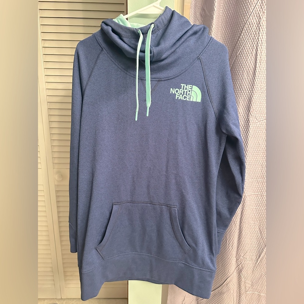 North face long fitting hoodie. Blue with teal accents. Size medium